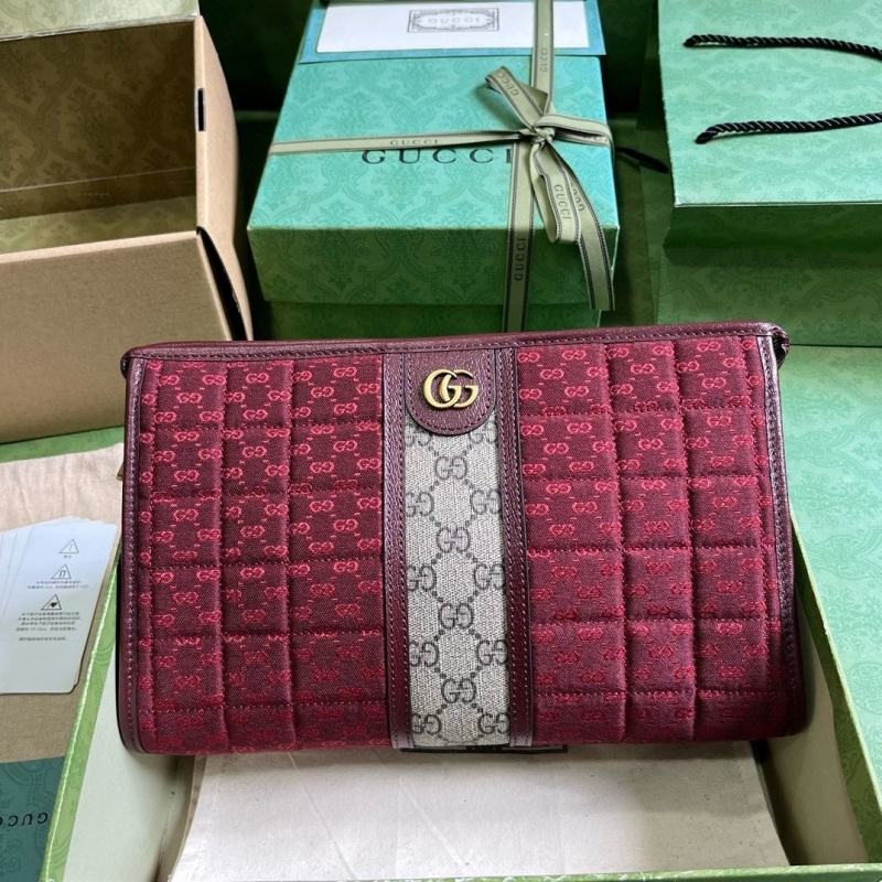 G*u*i top handle bags